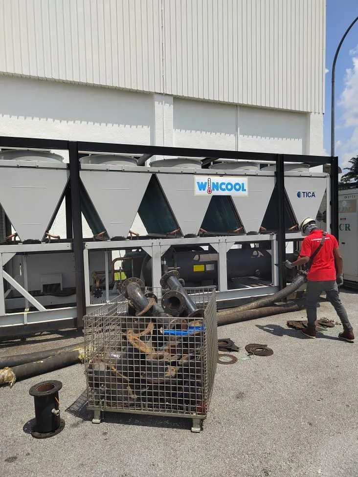 Industrial chiller rental setup in Penang with temporary piping connection during emergency cooling support